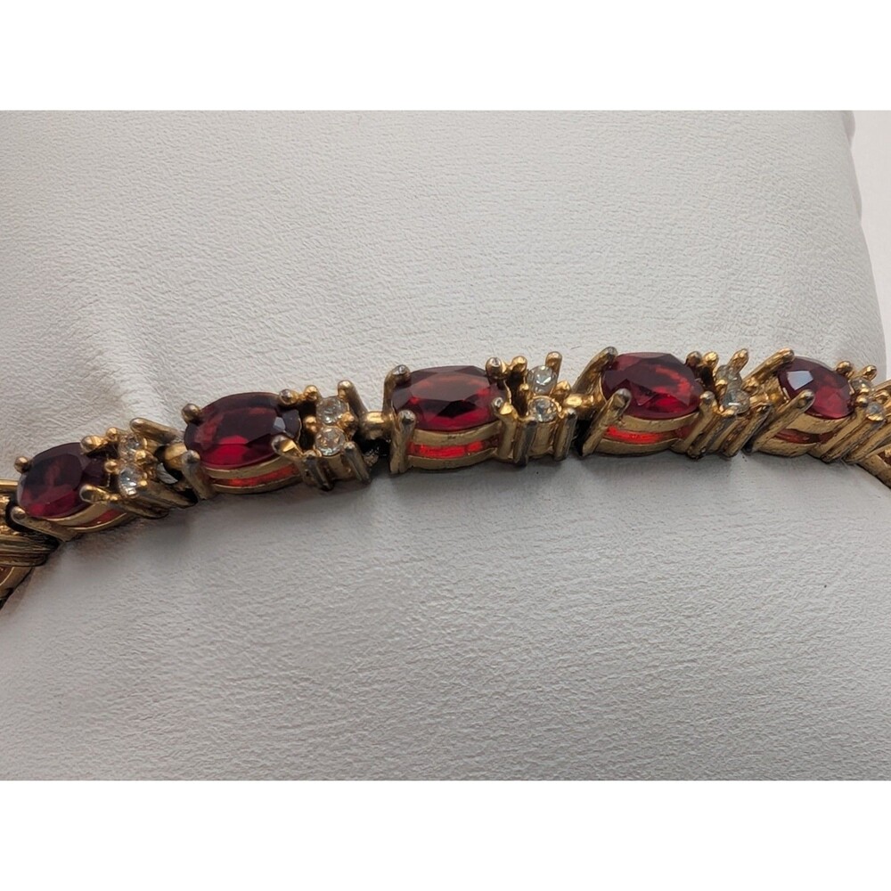 Vintage Avon Gold Tone Ruby Red Rhinestone Crystal Classic Tennis Bracelet 7.5"